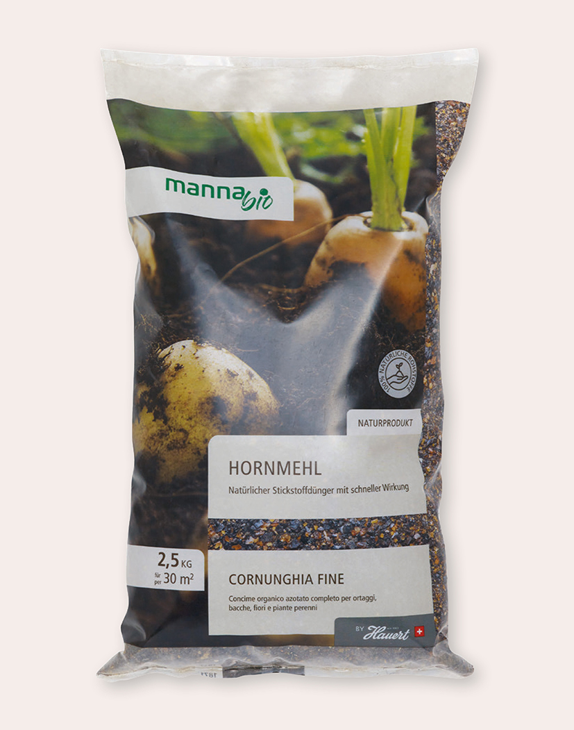 2,5-kg-Packung MannaBio Hornmehl, naturbelassener Stickstoffdünger; Verpackung mit Foto von Knollen, Markenlogo und Produktinformation sichtbar