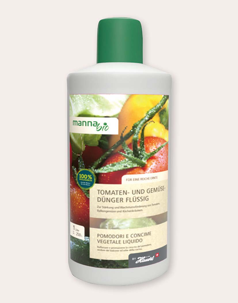 Mannabio Tomaten- und Gemüsedünger, flüssig, 1 L – weiße Flasche mit grünem Verschluss und Etikett mit Tomatenmotiv