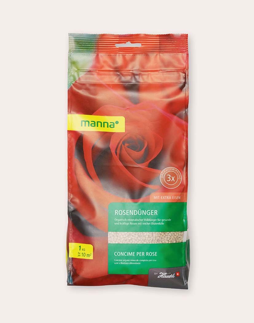 Packung manna Rosendünger 1 kg mit großem roten Rosenmotiv, grünem Label und sichtbarem Granulat; Angabe: 1 kg für 10 m²
