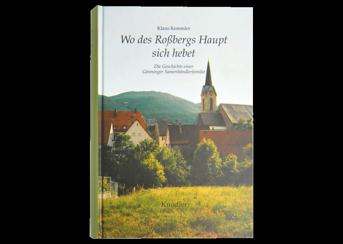 Buchcover von 'Wo des Roßbergs Haupt sich hebet' von Klaus Kemmler: idyllische Dorfszenerie mit Kirche, Hügeln und grüner Wiese, Hardcover-Ausgabe (Verlag Knödler).