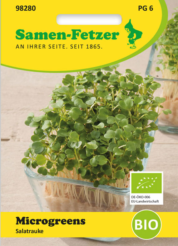 Packung Samen-Fetzer BIO Microgreens Salatrauke mit frisch gekeimten Rucola-Microgreens in einem Glas, EU-Bio-Logo sichtbar