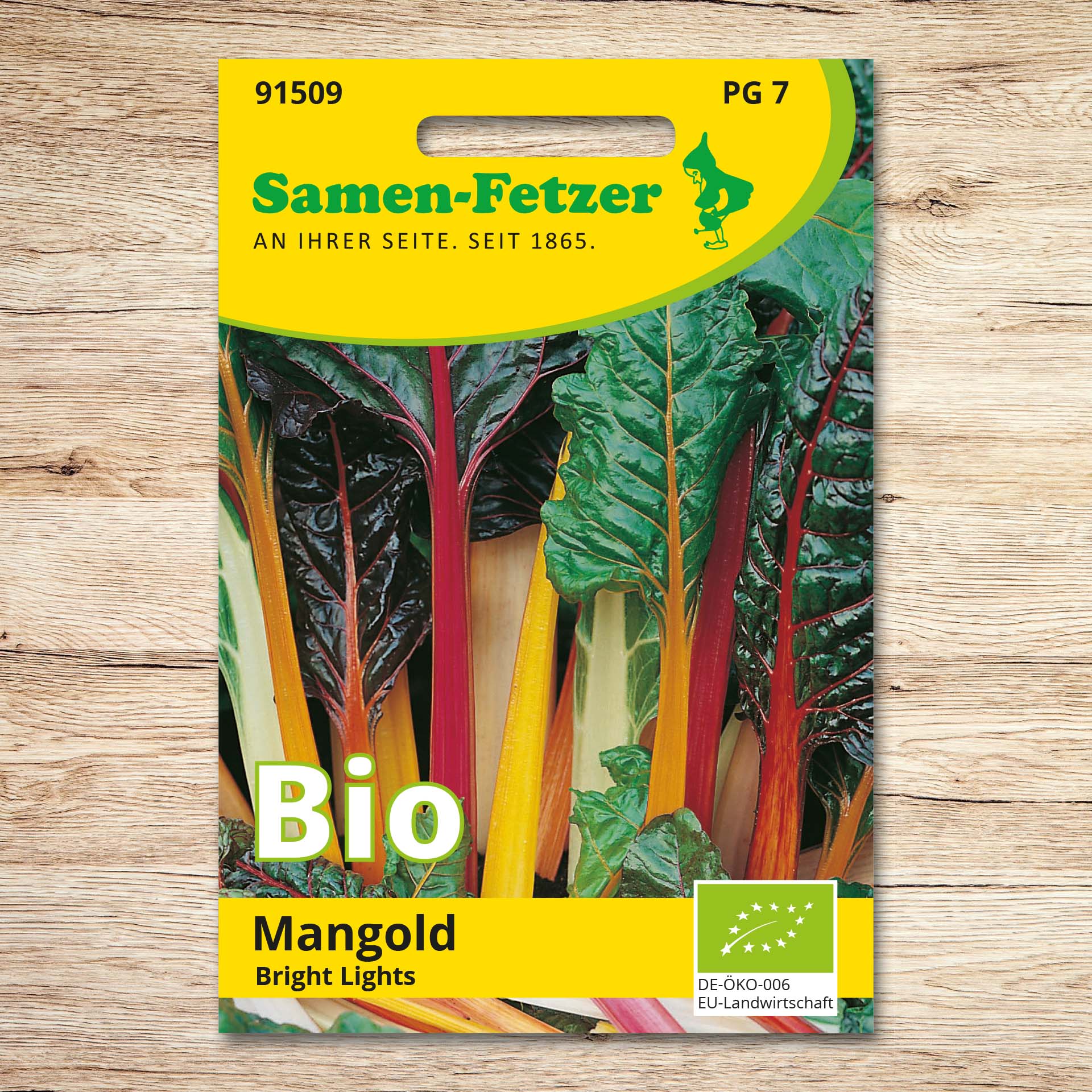 Saatgutpackung Mangold (Bio) Bright Lights von Samen-Fetzer mit bunten Mangoldstielen in Gelb, Rot und Weiß sowie dunkelgrünen Blättern