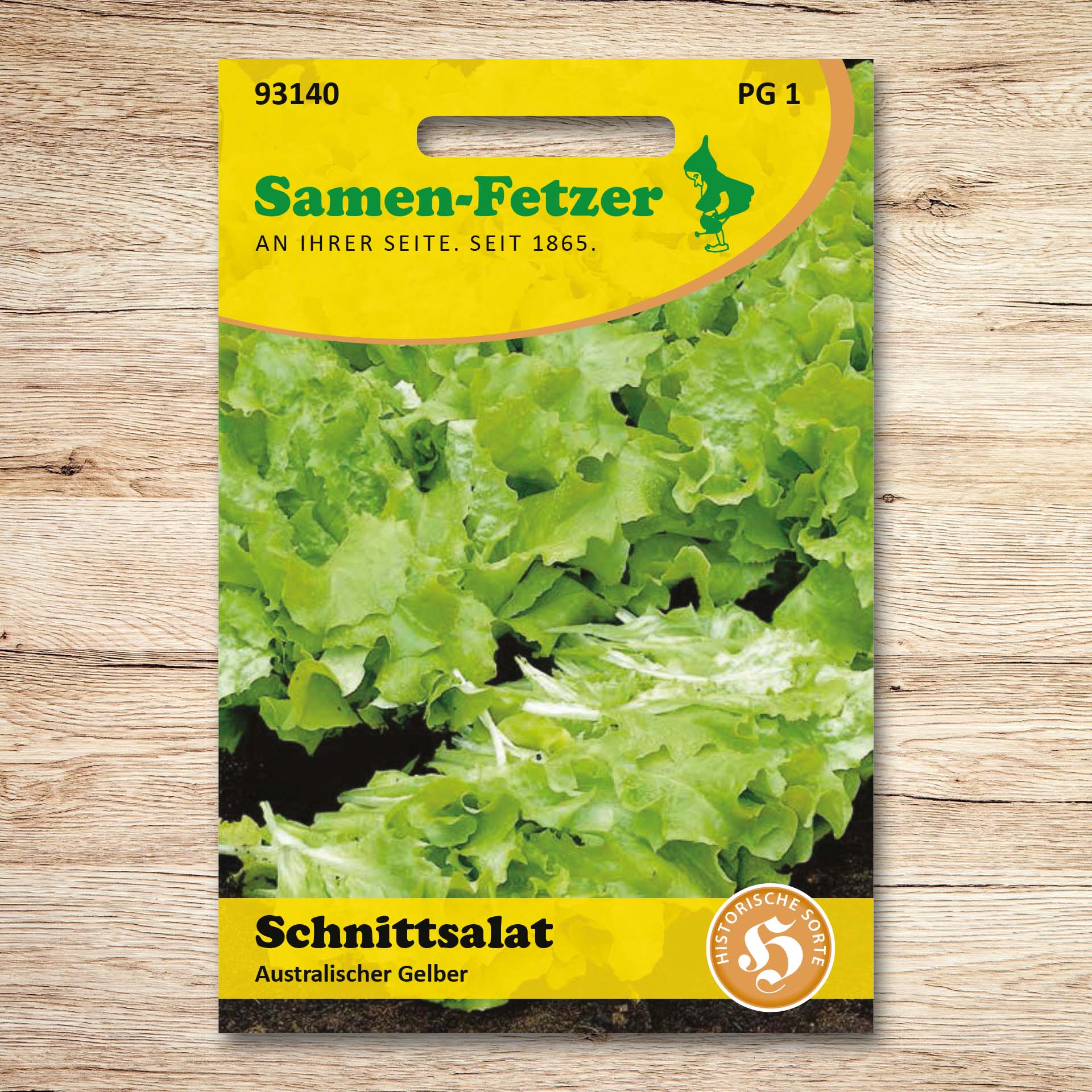 Saatgutpackung von Samen-Fetzer für Schnittsalat Australischer Gelber mit gekrausten grünen Blättern, vitaminreich, ertragreich und ideal für Mischsalate und Dekoration.