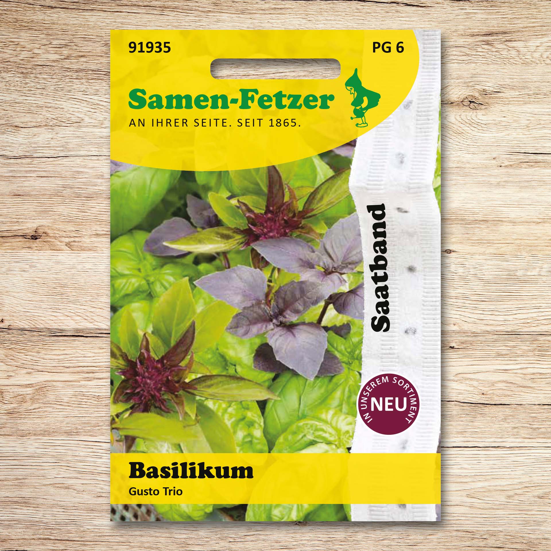 Abgebildet ist die Samen-Fetzer Verpackung Saatband Basilikum Gusto Trio mit rotem Basilikum, Genovese und Thai-Basilikum, geeignet für Topf und Freiland.