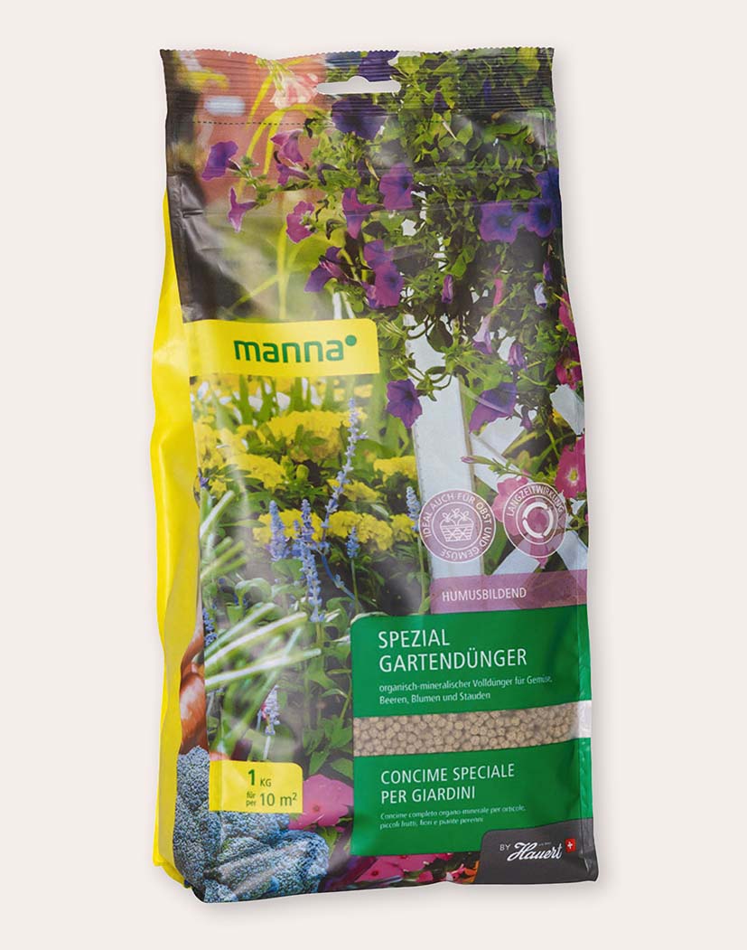 Packung Manna Spezial Gartendünger 1 kg, gelb-grüne Verpackung mit Blumenmotiv, körniger organisch-mineralischer Volldünger für Gemüse, Beeren, Blumen und Stauden